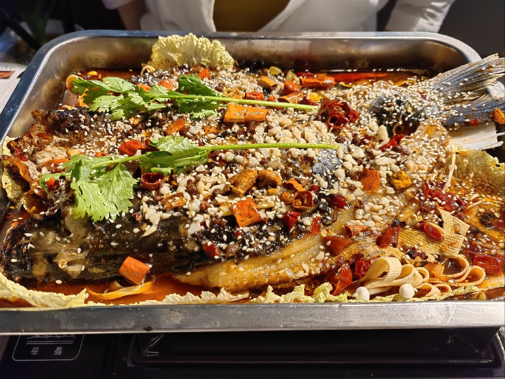 学万州烤鱼学费一般多少？揭秘创业者的首选项目！